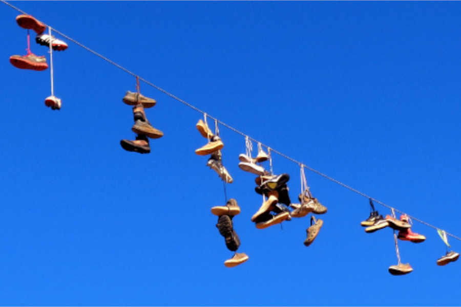 Why Do People Throw Shoes on Power Lines - To Make a Graffiti -Shoefiti